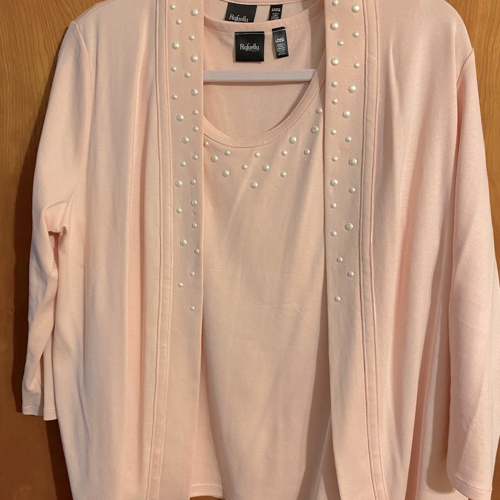 2 pieces, cardigan and shell, with pearl studs .